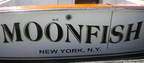 Vinyl lettering on a yacht Vinyl lettering on a yacht