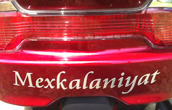 Custom lettering on a motorcycle. Custom lettering on a motorcycle.