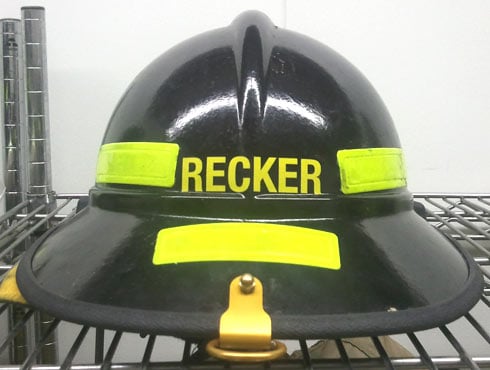 Custom lettering on a fireman's helmet. Custom lettering on a fireman's helmet.