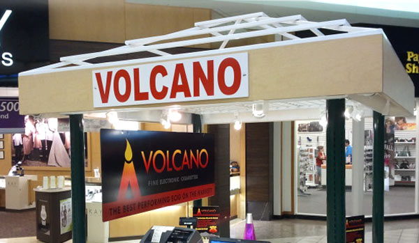 Custom vinyl lettering on a mall kiosk Custom vinyl lettering on a mall kiosk