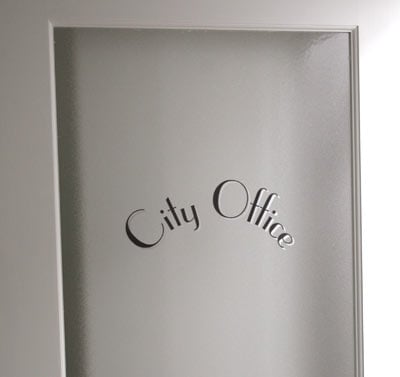 Custom vinyl lettering on an office door Custom vinyl lettering on an office door