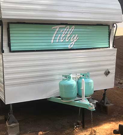 Custom lettering on a vintage trailer Custom lettering on a vintage trailer