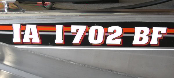 Custom lettering on a boat Custom lettering on a boat