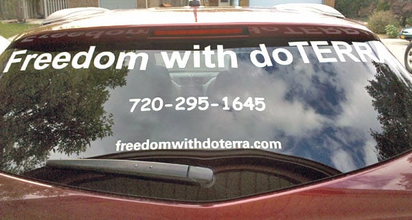 Vinyl lettering on a vechicle window Vinyl lettering on a vechicle window