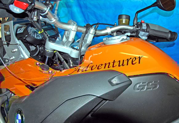 Custom lettering on a motorcycle fuel tank Custom lettering on a motorcycle fuel tank