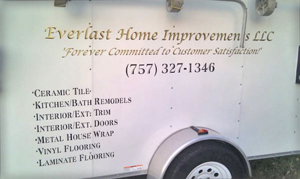 Custom vinyl lettering on a trailer Custom vinyl lettering on a trailer